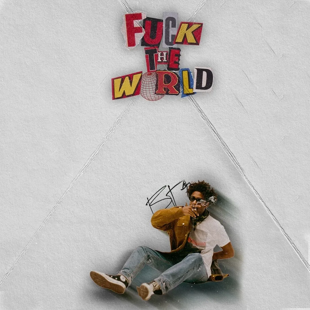 Creased white paper background with the album title in mismatched cut-out letters and a cut-out photo of a man in a mustard jacket sitting on the floor.
